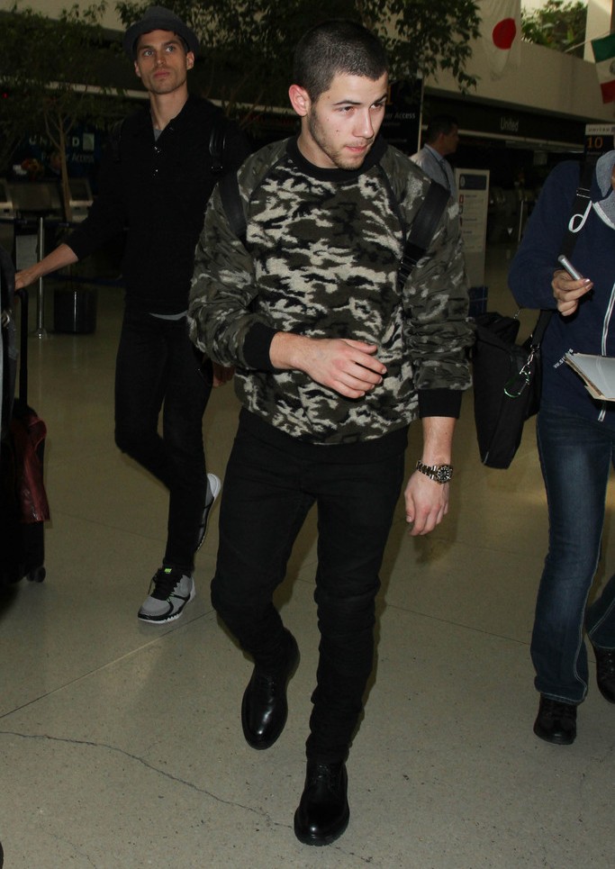 Spotted: Nick Jonas in a MSGM Camouflage Sweat