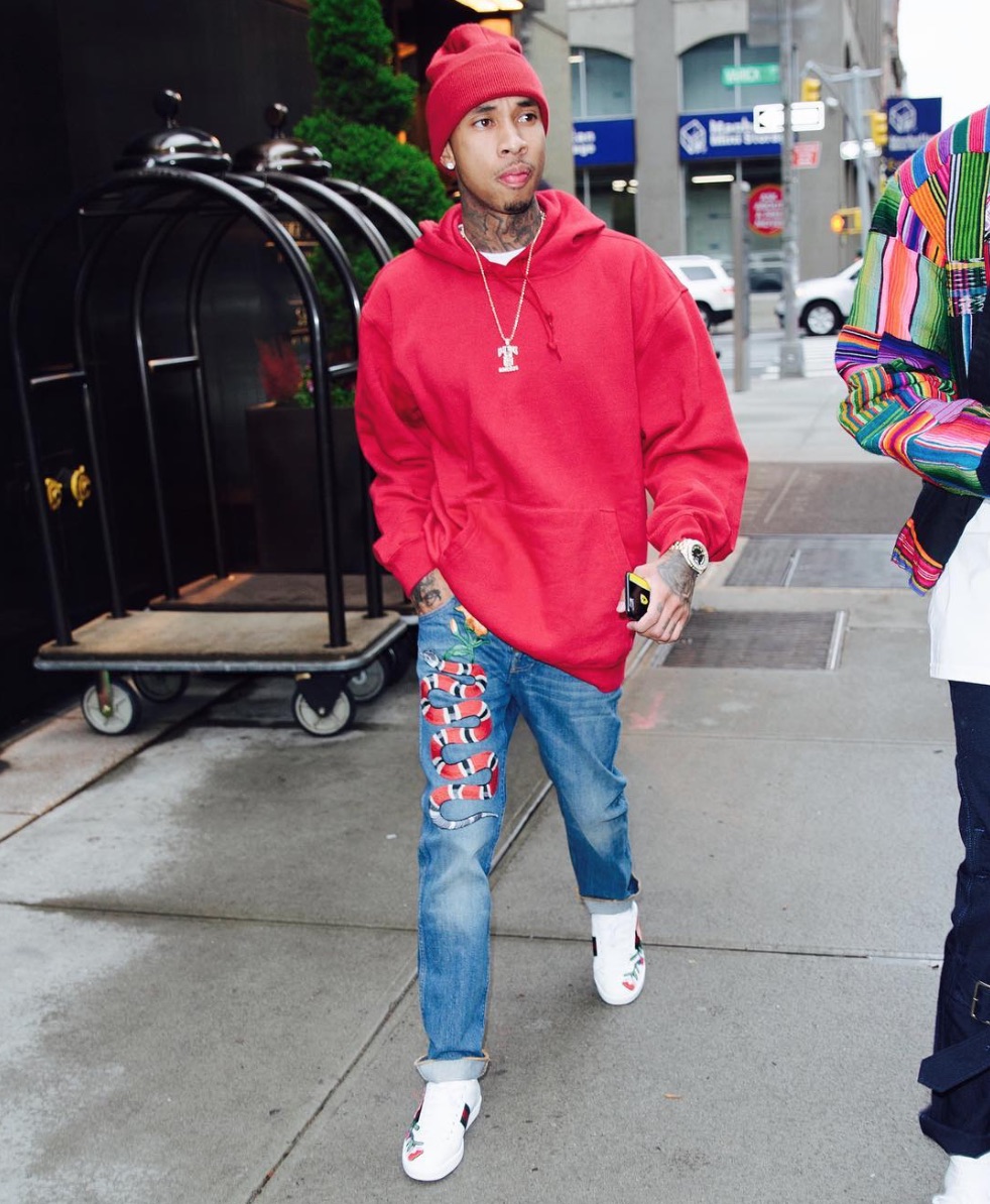Spotted: Tyga In NYC Wearing Gucci Embroidered Jeans And Sneakers