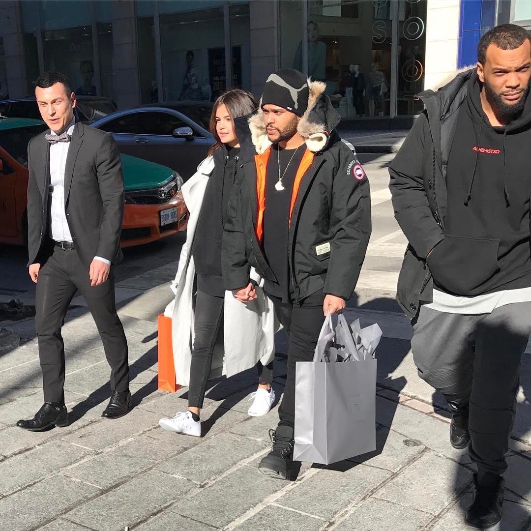 SPOTTED: The Weeknd With Selena Gomez In Canada Goose Coat And Puma Beanie