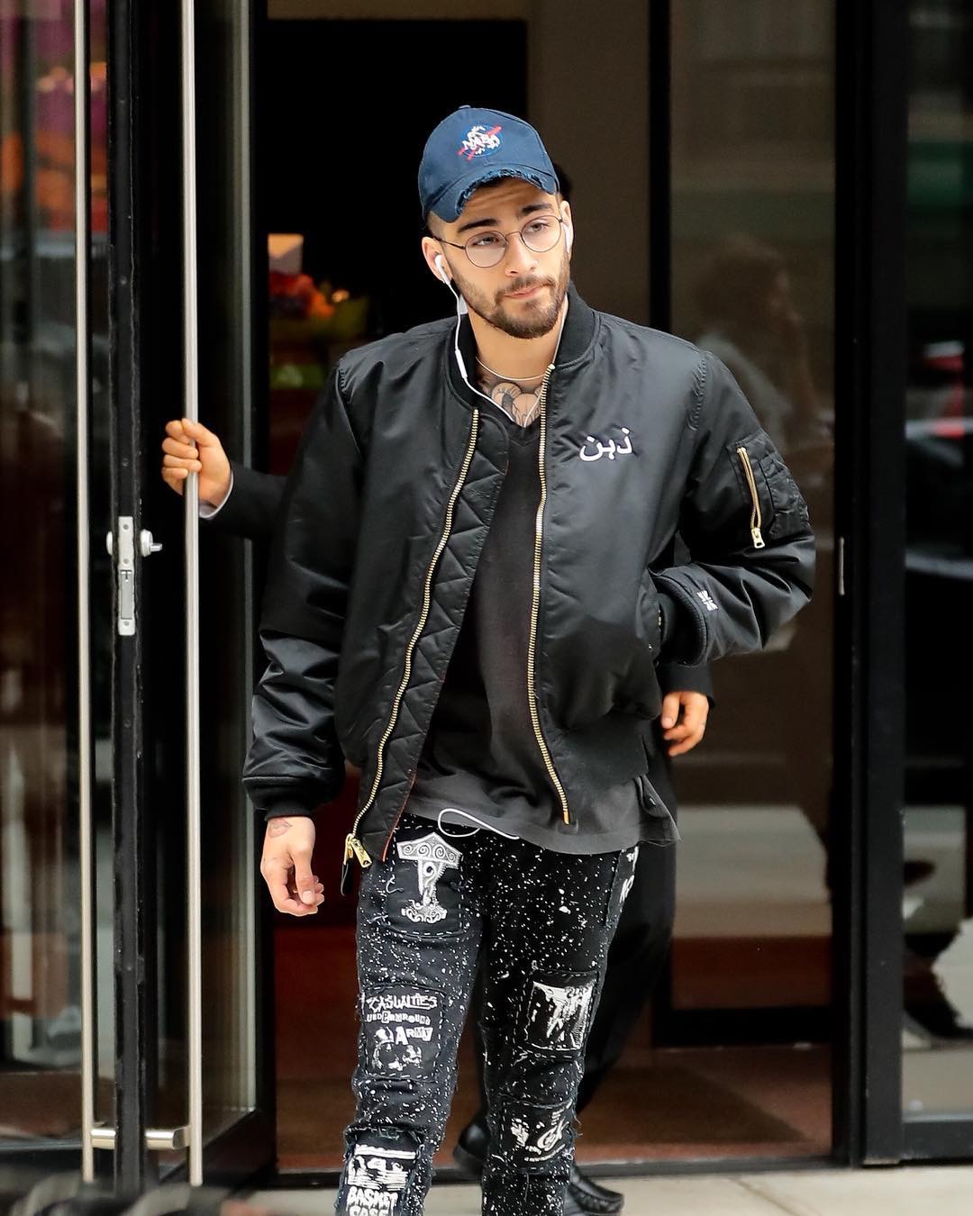 Spotted: Zayn Malik Wearing An Arabic Tour Merch Military Jacket