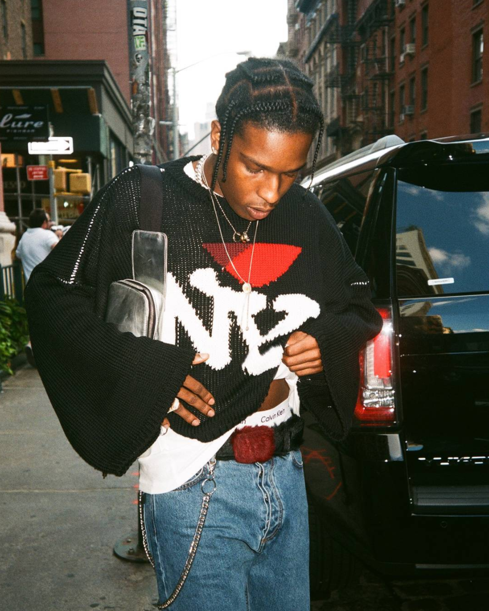 SPOTTED: A$AP Rocky In Raf Simons Sweater, Prada Belt, Calvin Klein Briefs And Vans Sneakers