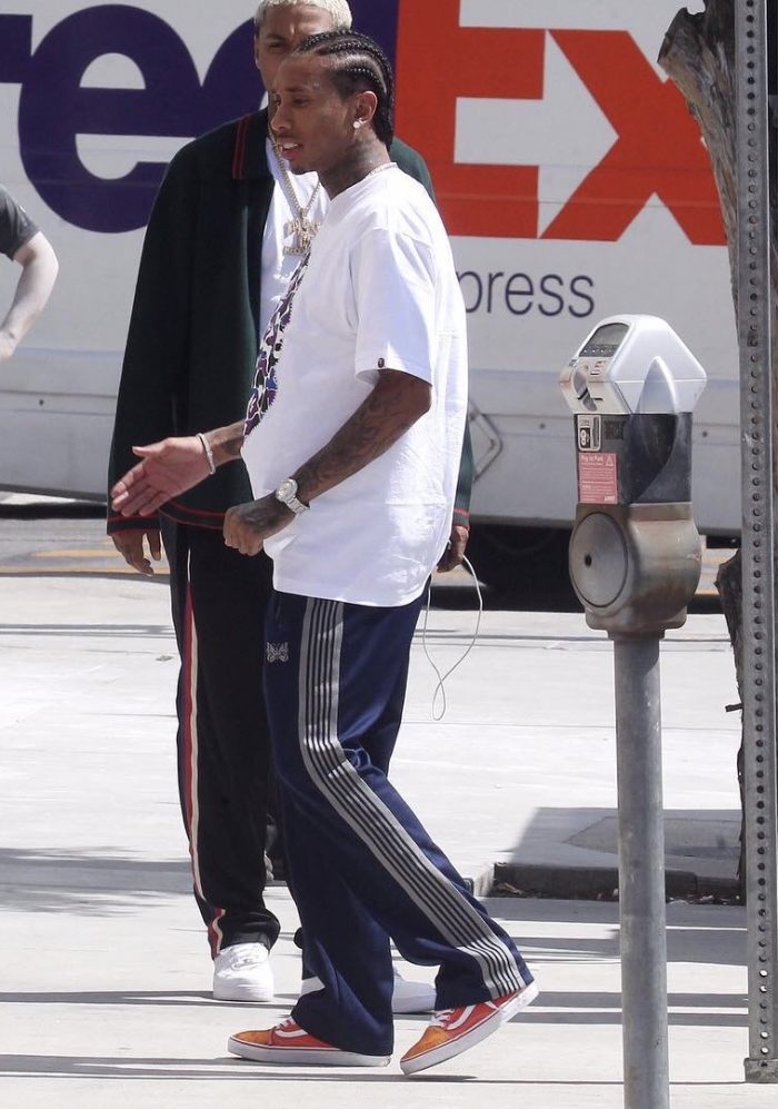 SPOTTED: Tyga In BAPE T-Shirt, Needles Track Pants And Custom Vans ...