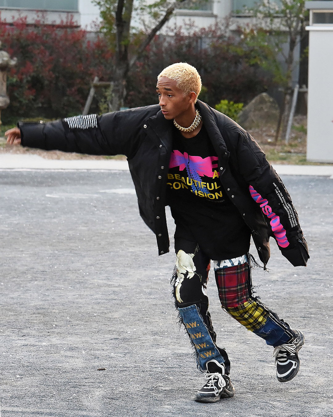 Jaden Smith wearing a Louis Vuitton x Supreme denim jacket while