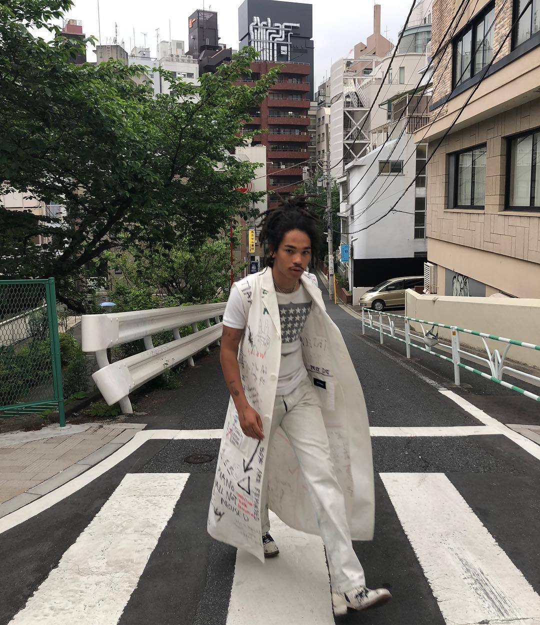 Luka Sabbat wearing Black and White Varsity Jacket, Black and