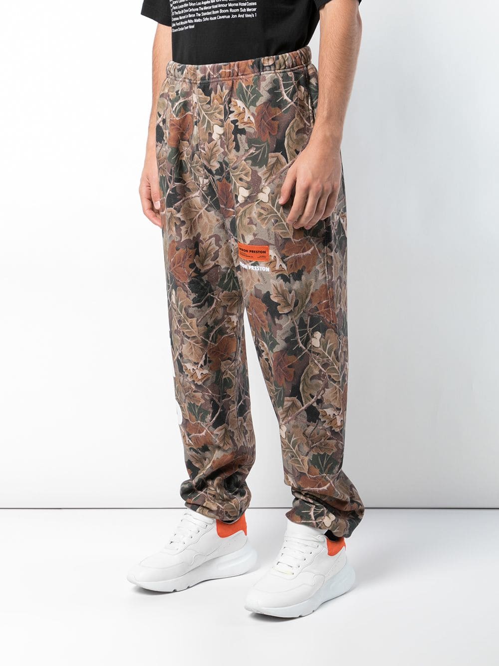 HERON PRESTON leaf print track trousers