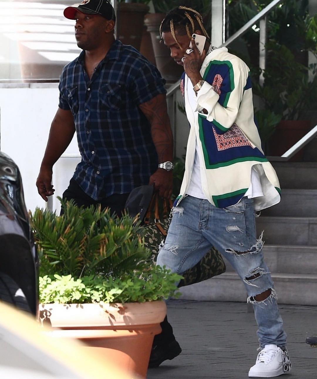 travis scott ripped jeans