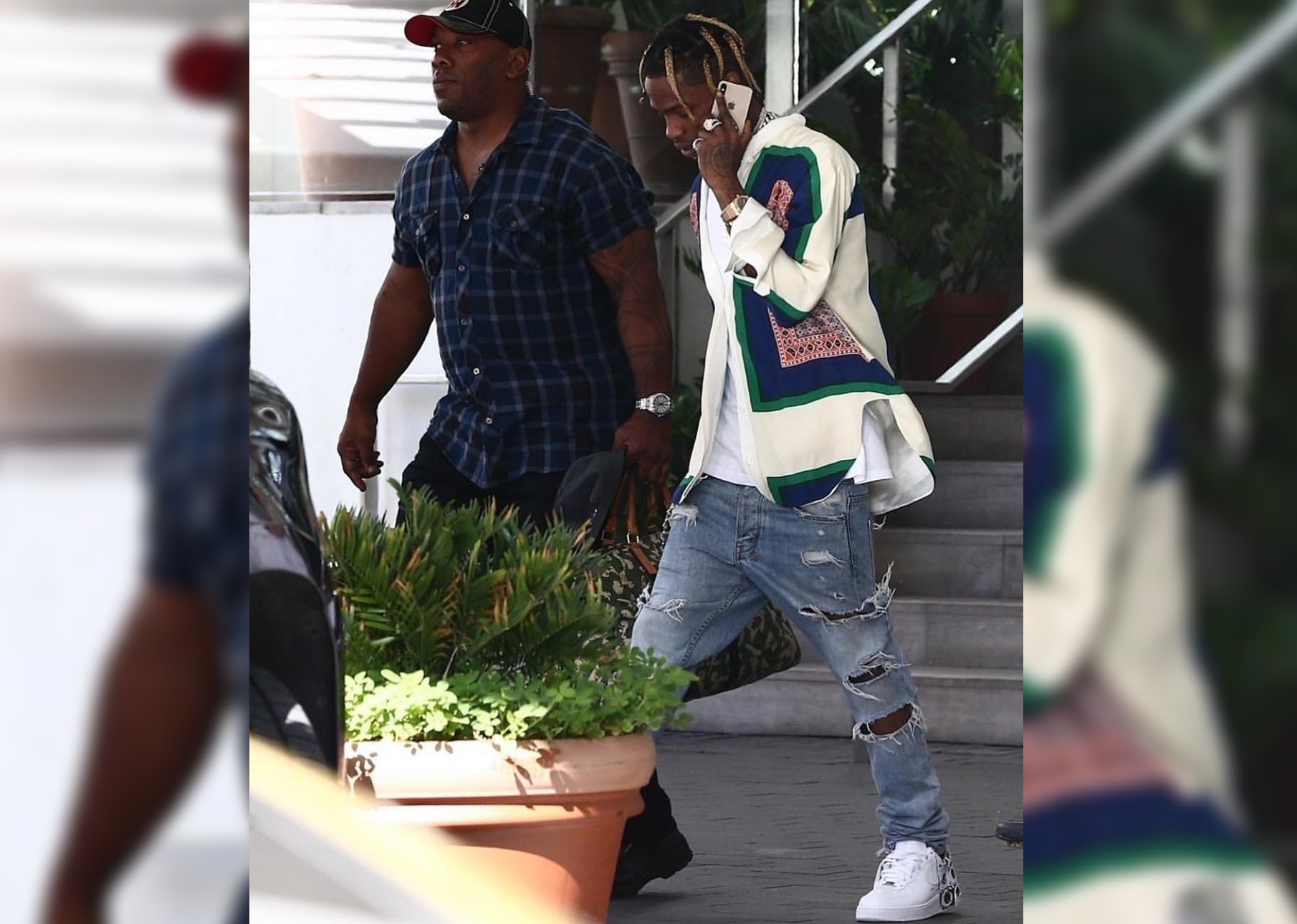SPOTTED: Travis Scott Steps Out in CELINE and Supreme x COMME des Garcons x Nike