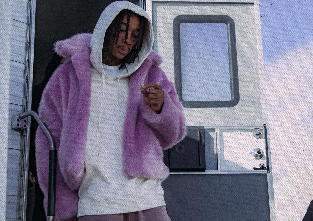 SPOTTED: Wiz Khalifa Steps Out in Purple Fur Coat