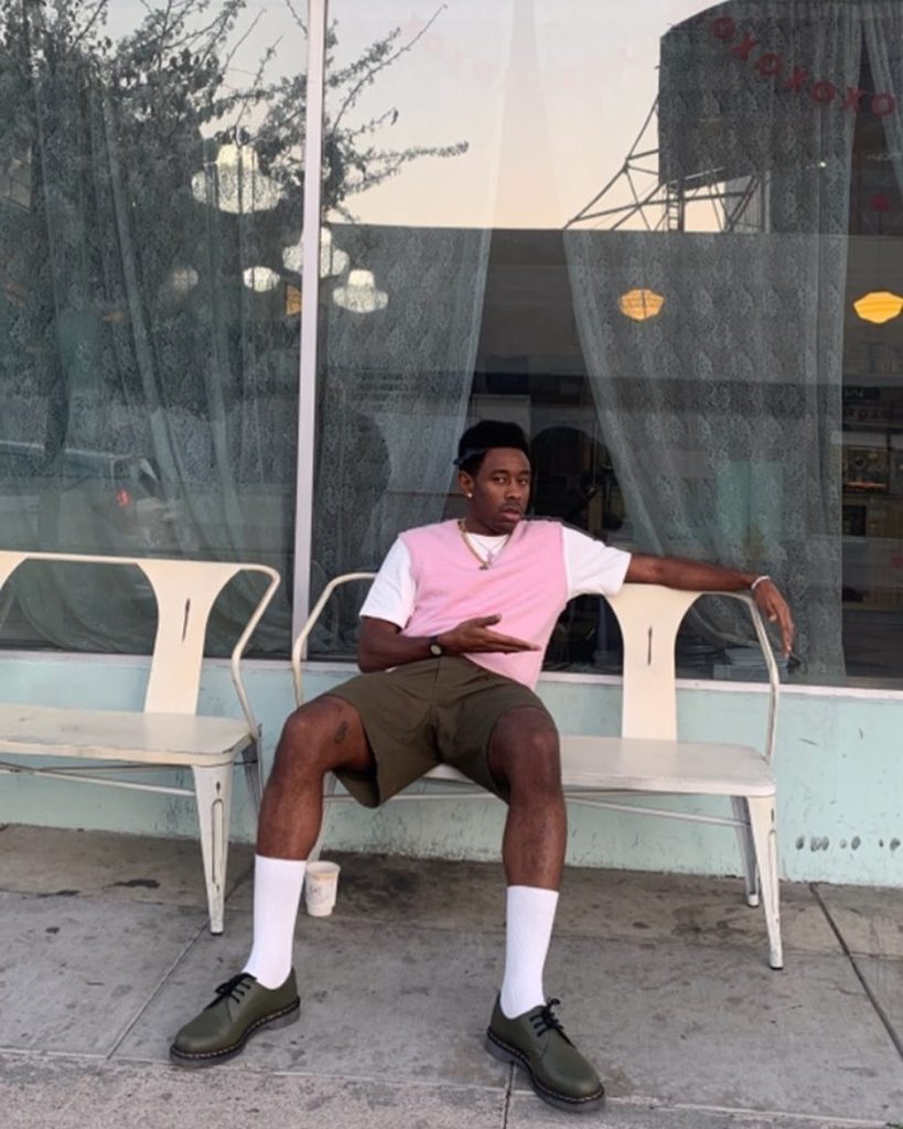 SPOTTED: Tyler, The Creator Rocks Pink Sweater Vest With Dr.Martens ...