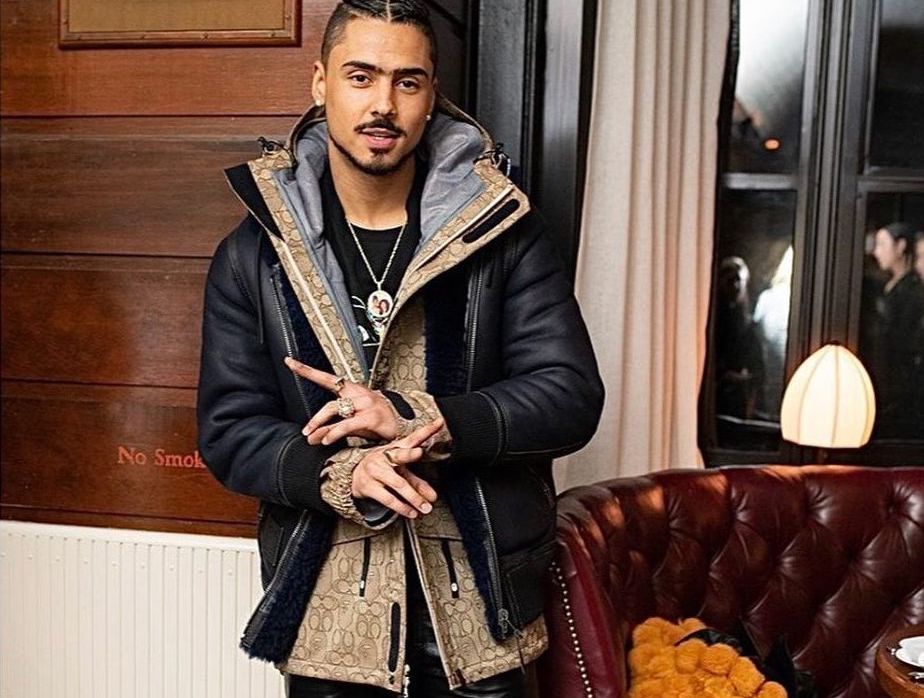 SPOTTED: Quincy attends NYFW Coach Dinner in Black Shearling Jacket