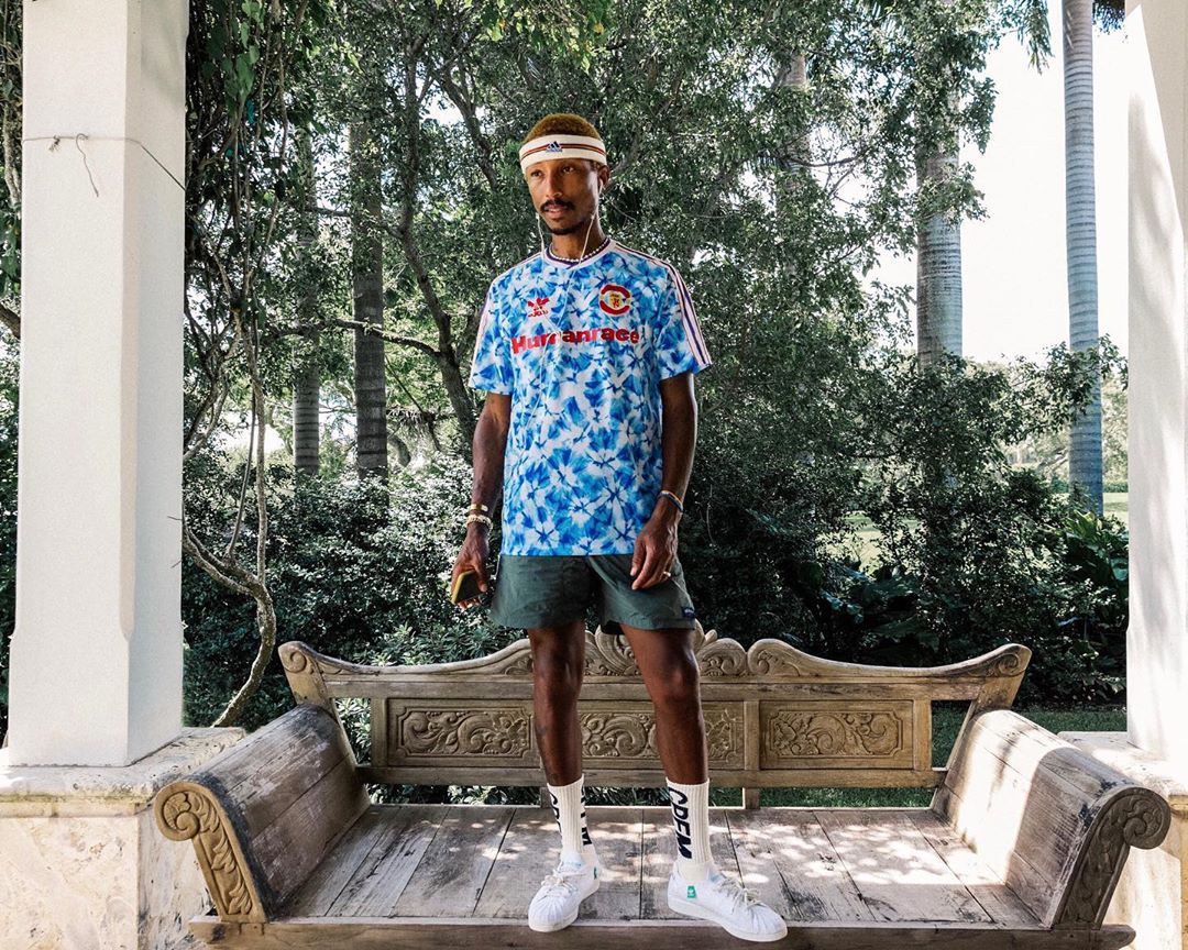 SPOTTED: Pharrell Shows How To Style Football Shirts