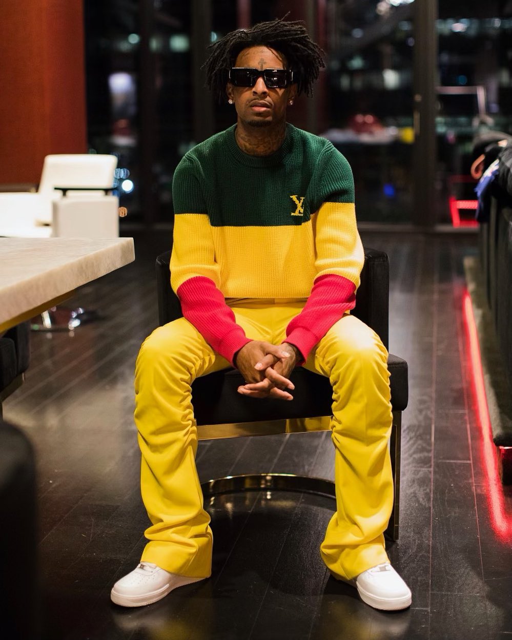 SPOTTED: 21 Savage dons Louis Vuitton 'Jamaican Stripe' Jumper