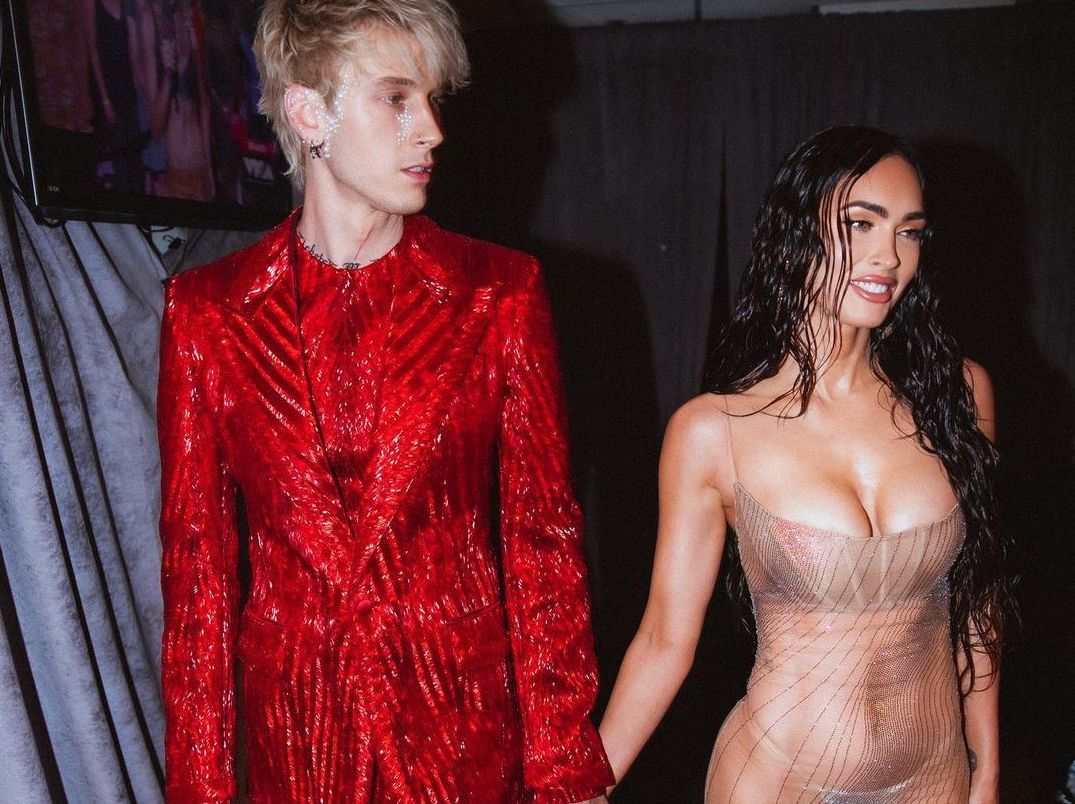 SPOTTED: Machine Gun Kelly attends VMAs in Glittering Berluti Suit