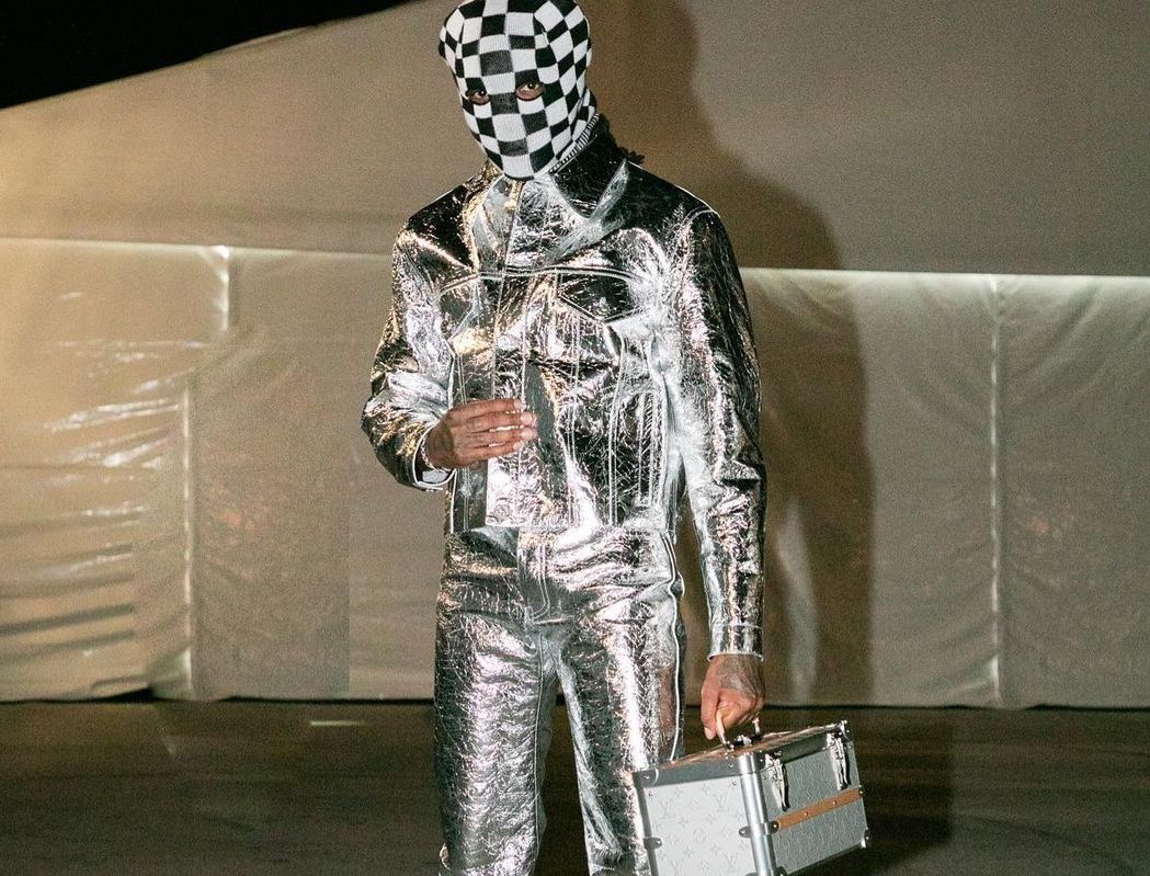 SPOTTED: Quavo Huncho walks the Louis Vuitton Show in Silver Getup