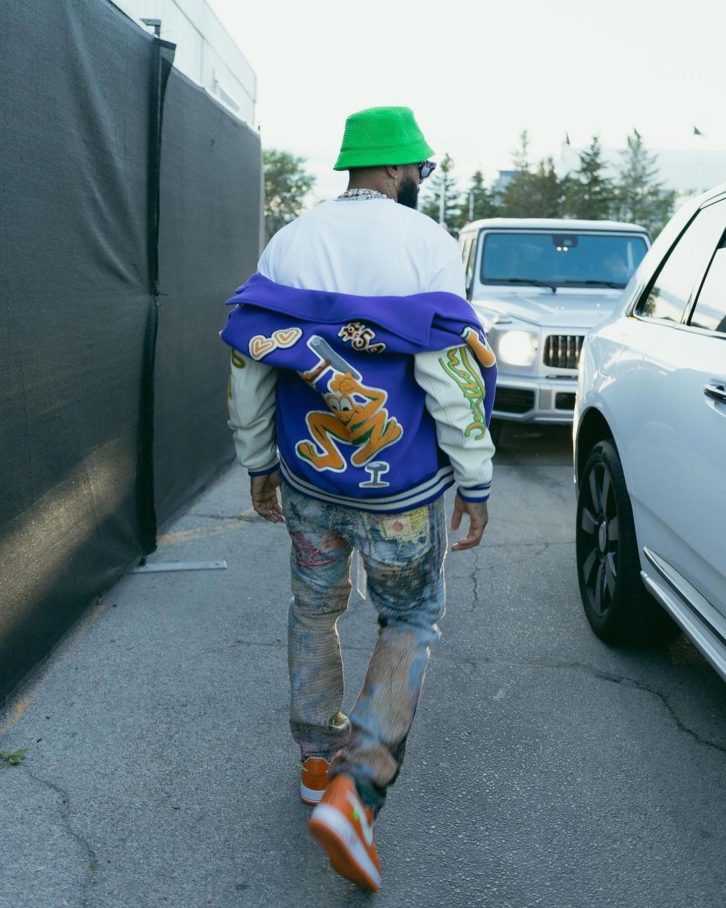Celebs Love: Odell Beckham Jr., Luka Sabbat, Vic Mensa and Money Man All  Wore Louis Vuitton's Blue and Neon Green Gradient Varsity Bomber Jacket –  Fashion Bomb Daily