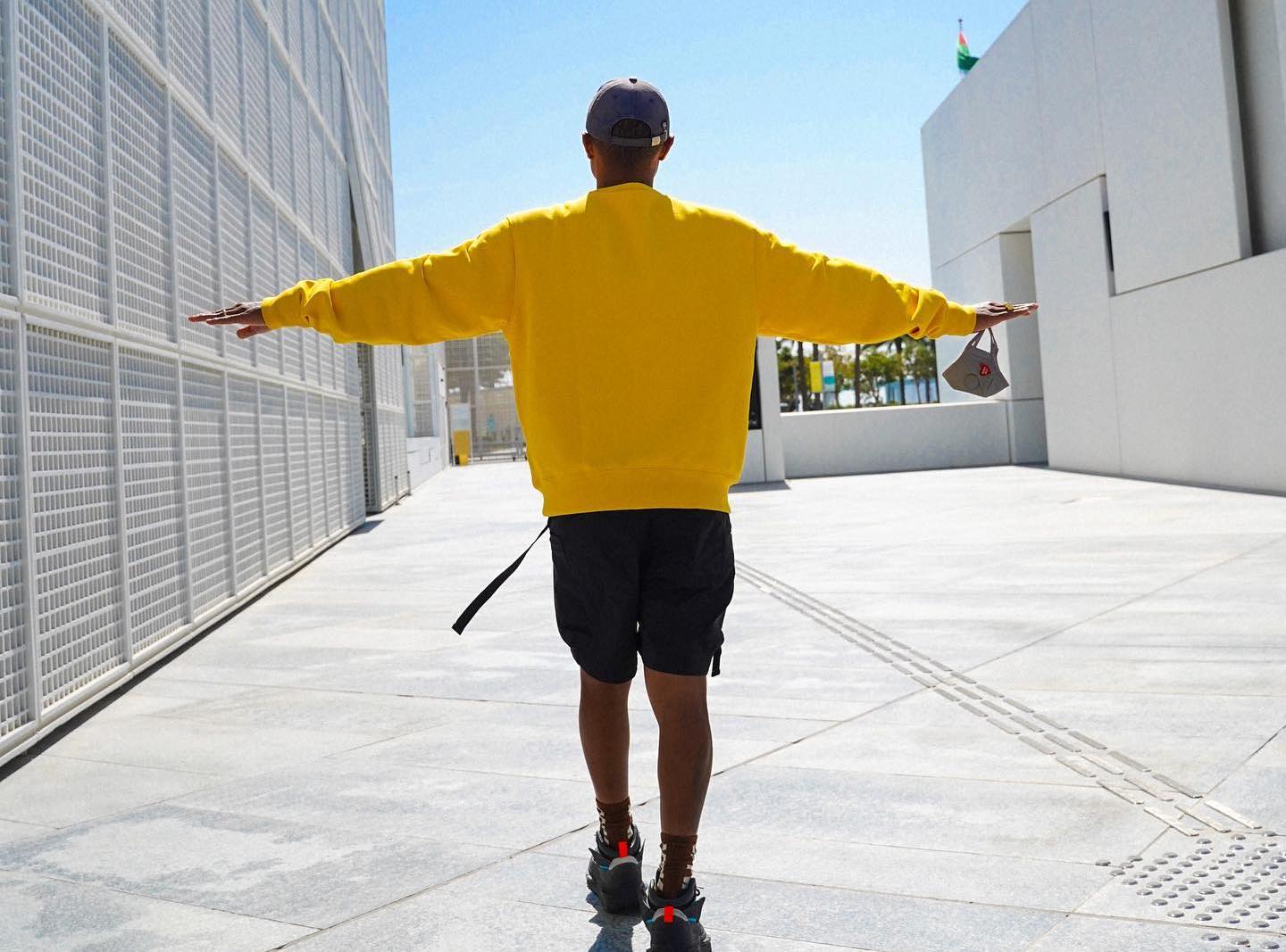 SPOTTED: Pharrell Williams Keeps it Simple in Human Race