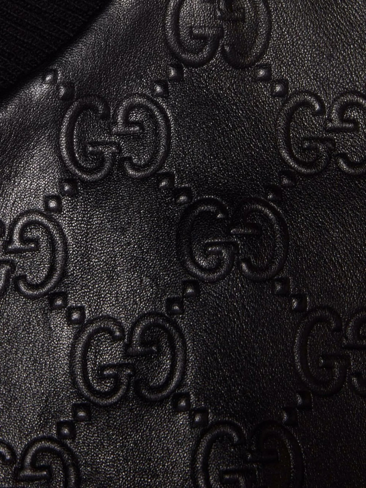 Gucci GG-debossed Leather Backpack in Black for Men
