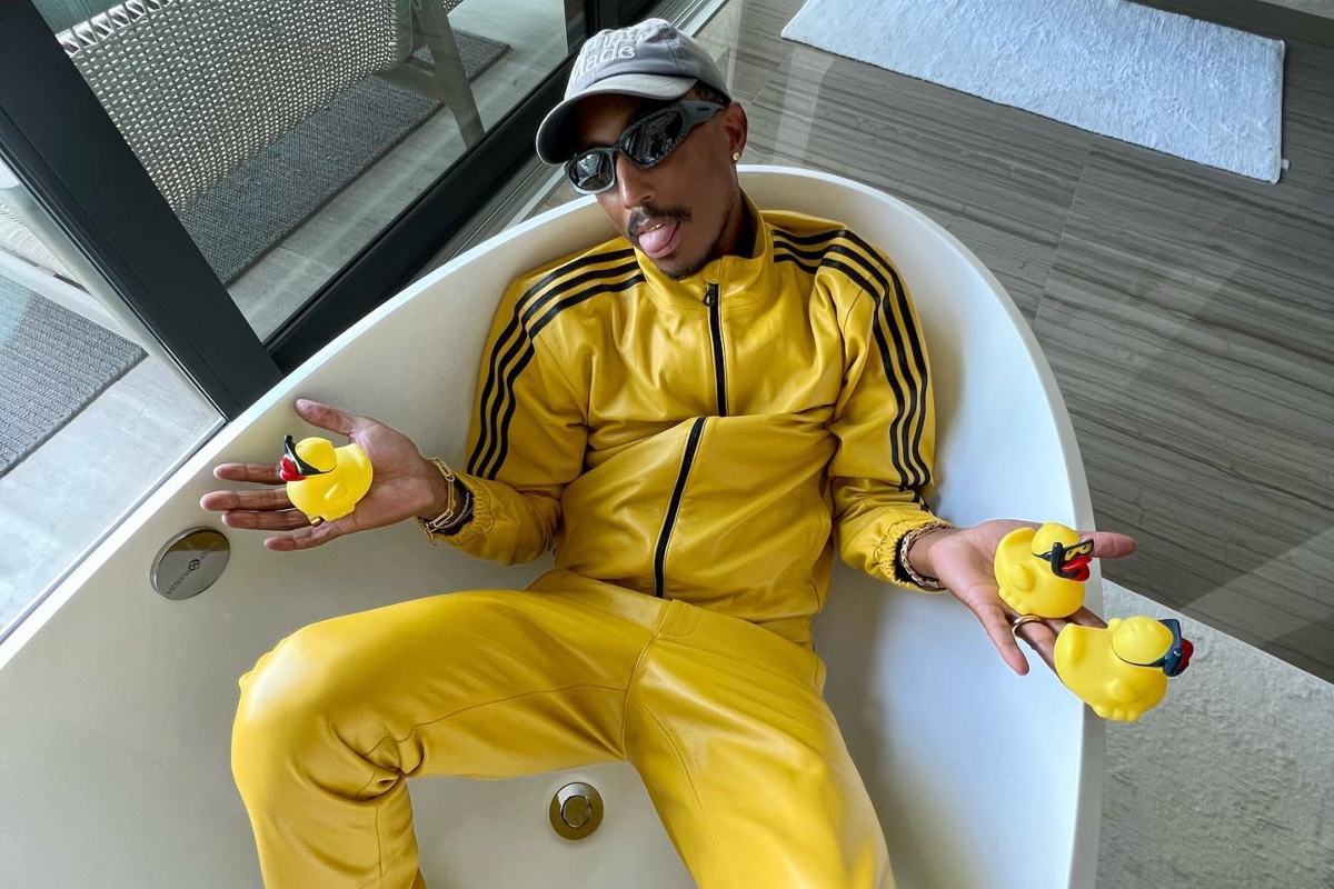 SPOTTED: Pharrell Williams Opts for Youthful Yellow Look Wearing Full  Humanrace x adidas Ensemble – PAUSE Online