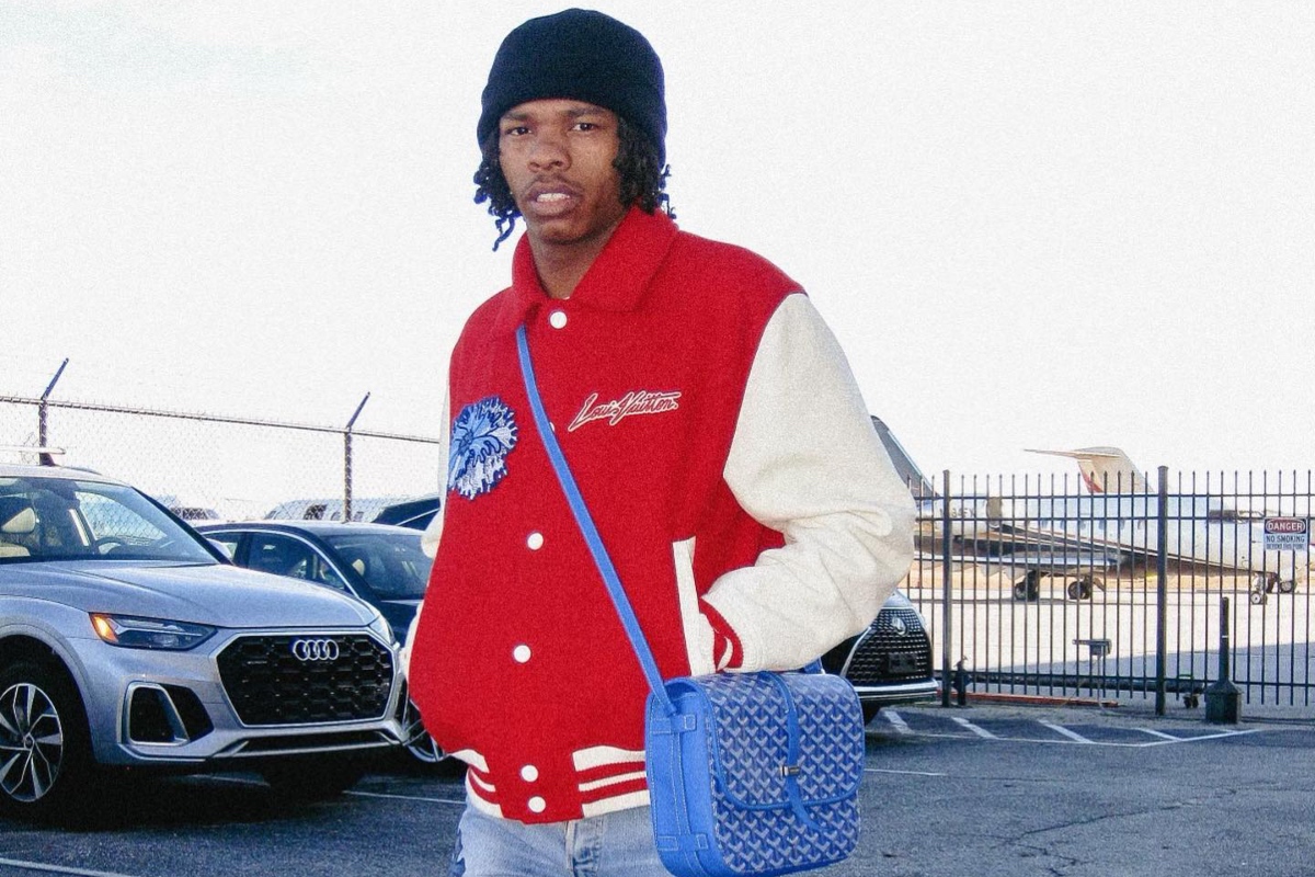 SPOTTED: Lil Baby Looks All American in Red, White & Blue Wearing Goyard & Louis Vuitton