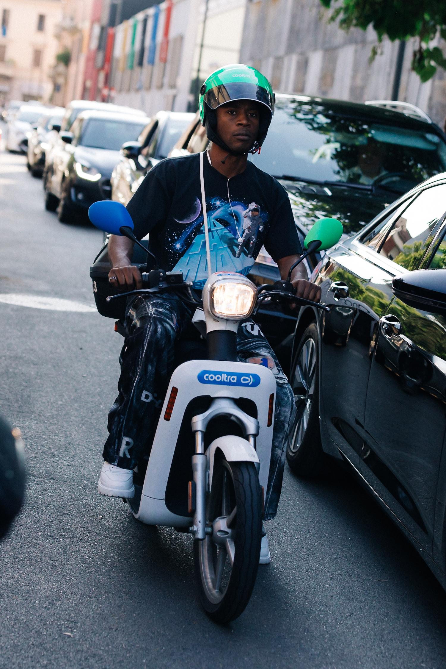 Man with blue leather Louis Vuitton backpack with elephant before Daks  fashion show, Milan Fashion Week street style on January 14, 2018 in Milan.  – Stock Editorial Photo © AndreaA. #272280016